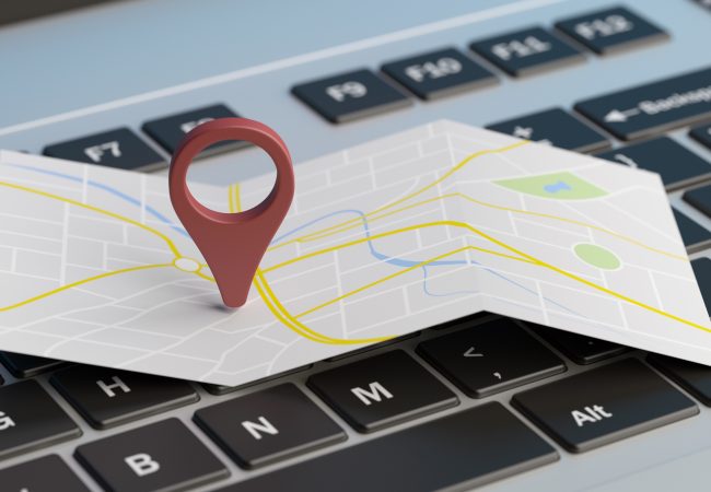 Online maps, gps navigation concept. Map pointer location on a computer laptop. 3d illustration